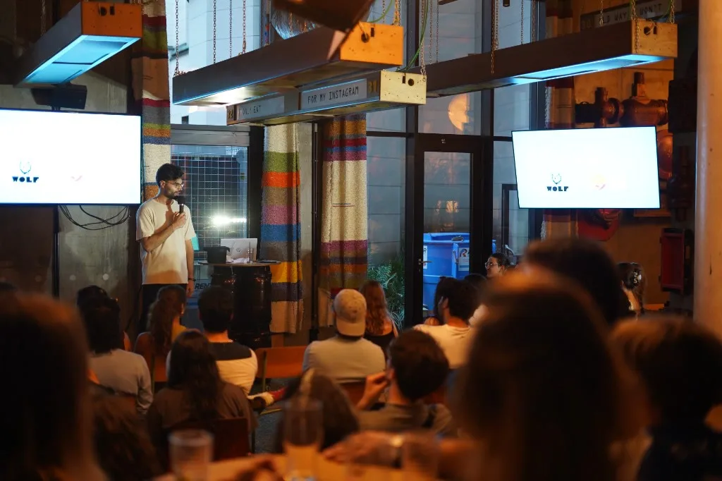 WOLF Sharing Food Market — comedian performing in The Lounge